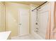 Bright bathroom featuring a shower and tub, white tile, and a vanity with great lighting at 2710 Royston Dr, Duluth, GA 30097