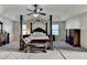 The main bedroom includes tray ceilings, lots of space, and warm neutral tones at 831 Pine Arbor Ln, Lawrenceville, GA 30043