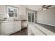 Bright kitchen with modern appliances and sliding glass doors to the deck at 105 Remington Ct, Woodstock, GA 30188