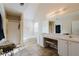 Bathroom featuring dual sinks, vanity area, a soaking tub, and glass enclosed shower at 59 Pompas Ct, Dallas, GA 30157