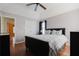 Bedroom with wood floors, vaulted ceiling, ceiling fan and double door closet at 59 Pompas Ct, Dallas, GA 30157