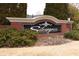 Entrance sign for Silvergrass community featuring brick, black and white color scheme at 59 Pompas Ct, Dallas, GA 30157