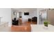 The living room features a fireplace and offers sightlines into the adjacent kitchen at 59 Pompas Ct, Dallas, GA 30157