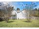 Backyard of home featuring a deck with stairs to the yard and mature trees at 1165 Hardin Bridge Rd, Euharlee, GA 30145