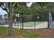 Community basketball court surrounded by fencing, offering a space for sports and recreation at 1464 Oglethorpe Dr, Suwanee, GA 30024