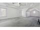 Large main bedroom with vaulted ceiling and carpet at 1464 Oglethorpe Dr, Suwanee, GA 30024