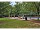 A fun community playground with swings, slides, and a grassy area for to enjoy at 1464 Oglethorpe Dr, Suwanee, GA 30024