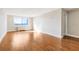 Spacious living room area with hardwood floors and plenty of natural light at 2479 Peachtree Ne Rd # 605, Atlanta, GA 30305