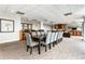Resident lounge featuring a long dining table and bar with a tv at 2479 Peachtree Ne Rd # 605, Atlanta, GA 30305