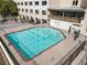 Outdoor pool with a brick trim and metal surrounding fence, ideal for recreation and relaxation at 2479 Peachtree Ne Rd # 605, Atlanta, GA 30305