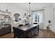 Bright dining room featuring hardwood floors, modern lighting, and stylish décor at 3667 Peachtree Ne Rd # 16, Atlanta, GA 30319