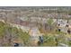 Aerial view of house and surrounding community at 1868 Lakeview Bend Way, Buford, GA 30519