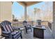 Relaxing back deck with fire pit, grill, and wooded views at 1868 Lakeview Bend Way, Buford, GA 30519