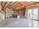 Unfinished basement with high ceilings and walkout access at 1868 Lakeview Bend Way, Buford, GA 30519