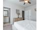 Bedroom featuring a private bathroom and ample closet space at 1868 Lakeview Bend Way, Buford, GA 30519