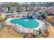 Community pool with a pool house and fenced-in area at 1868 Lakeview Bend Way, Buford, GA 30519