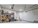 Spacious garage with overhead storage and epoxy floor at 1868 Lakeview Bend Way, Buford, GA 30519