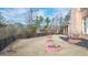 Landscaped backyard with circular gardens and a wooden fence at 2195 Morgan Ne Rd, Marietta, GA 30066