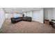 Finished basement recreation area with a large sectional sofa and TV at 2195 Morgan Ne Rd, Marietta, GA 30066