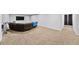 Finished basement featuring a sectional sofa and large TV, perfect for media at 2195 Morgan Ne Rd, Marietta, GA 30066