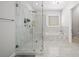 Spa-like bathroom with a large shower, soaking tub, and marble tile at 2195 Morgan Ne Rd, Marietta, GA 30066