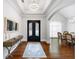 Elegant entryway with hardwood floors and a view of the dining area at 2195 Morgan Ne Rd, Marietta, GA 30066