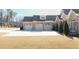 Three-car garage with light-beige doors at 2195 Morgan Ne Rd, Marietta, GA 30066