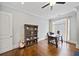 Home office features hardwood floors, built-in shelving, and large window at 2195 Morgan Ne Rd, Marietta, GA 30066