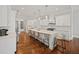 Modern kitchen with white cabinets, large island, and stainless steel appliances at 2195 Morgan Ne Rd, Marietta, GA 30066