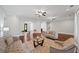 Bright living room features hardwood floors, two sofas, and a glass coffee table at 2195 Morgan Ne Rd, Marietta, GA 30066