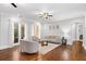 Spacious living room with hardwood floors and access to a backyard patio at 2195 Morgan Ne Rd, Marietta, GA 30066