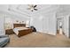 Bright main bedroom featuring a king-size bed and hardwood floors at 2195 Morgan Ne Rd, Marietta, GA 30066