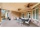 Large covered patio with comfortable seating and ceiling fans at 2195 Morgan Ne Rd, Marietta, GA 30066
