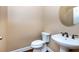 Small powder room with pedestal sink and toilet at 2969 Rivergreen Se Ln, Atlanta, GA 30339
