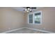 Bright bedroom with ceiling fan and windows at 2969 Rivergreen Se Ln, Atlanta, GA 30339