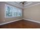 Bright bedroom with hardwood floors and large windows at 2969 Rivergreen Se Ln, Atlanta, GA 30339
