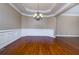 Formal dining room with hardwood floors and wainscoting at 2969 Rivergreen Se Ln, Atlanta, GA 30339