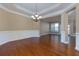 Bright dining room featuring hardwood floors and wainscoting at 2969 Rivergreen Se Ln, Atlanta, GA 30339