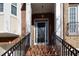 Townhouse features a black front door and brick steps with iron railings at 2969 Rivergreen Se Ln, Atlanta, GA 30339
