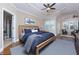 Large main bedroom with wood floors and sitting area at 2969 Rivergreen Se Ln, Atlanta, GA 30339
