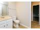 Simple bathroom with a toilet and a vanity with a sink at 5010 Mundy Dr, Cumming, GA 30028