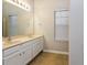 Bathroom with double vanity and neutral color palette at 5010 Mundy Dr, Cumming, GA 30028