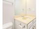 Clean bathroom with a beige vanity and a mirrored medicine cabinet at 5010 Mundy Dr, Cumming, GA 30028