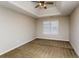 Bright bedroom featuring a window with blinds and carpet flooring at 5010 Mundy Dr, Cumming, GA 30028