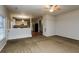 Open living room with kitchen views and access to backyard at 5010 Mundy Dr, Cumming, GA 30028