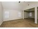Large main bedroom with high ceilings and carpet flooring at 5010 Mundy Dr, Cumming, GA 30028