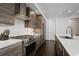 Modern kitchen features stainless steel appliances, an island, and wood cabinets at 504 Rankin Ne St # 4, Atlanta, GA 30308