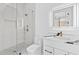 Bright bathroom featuring stand-up shower, marbled tile, and modern finishes at 2753 Camp Branch Rd, Buford, GA 30519