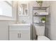 Updated bathroom with white vanity and shelving at 1084 Fairburn Nw Rd, Atlanta, GA 30331