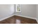 Spacious bedroom with hardwood floors and large window at 1084 Fairburn Nw Rd, Atlanta, GA 30331